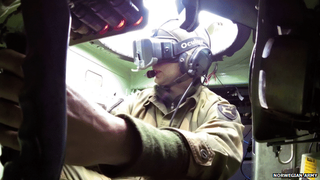 Image of tank driver wearing Oculus Rift headset, image taken from BBC online