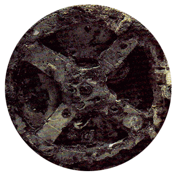 A circled X, part of the Antikythera Device found in Athens, scanned in from magazine