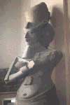 [SHOT OF A STATUE OF AKHENATEN, THE HERETIC PHARAOH, AS FOUND IN THE CAIRO MUSEUM, SUGGESTIVE OF JESUS MANDAM, THE SAVIOUR OF SUPRANORMALKIND, PHOTO TAKEN BY JIM MCPHERSON, 2000]