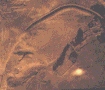 [Blow-Up of aerial shot taken by Egyptian Air Force, circa mid-30s, of the Gizeh Plateau, photograph of Something Like Sedon's Head by Jim McPherson, Year 2000]